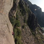 Barbara climbs up a granite flake