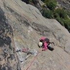 Barbara climbs the crack with the shallow step