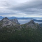 View down to the fjord, the road and the area.