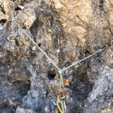 Typical belay using rock tunnels (Photo: Caro)