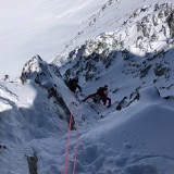 The route leads us through snow and rocks