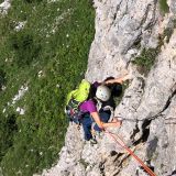 Barbara climbing the first pitch