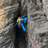 Mike climbing the chimney