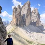 Barbara on the trail with view of the Three Peaks