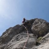 Sigi climbing a beautiful crux