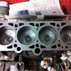 Engine reconditioning: cleaned pistons